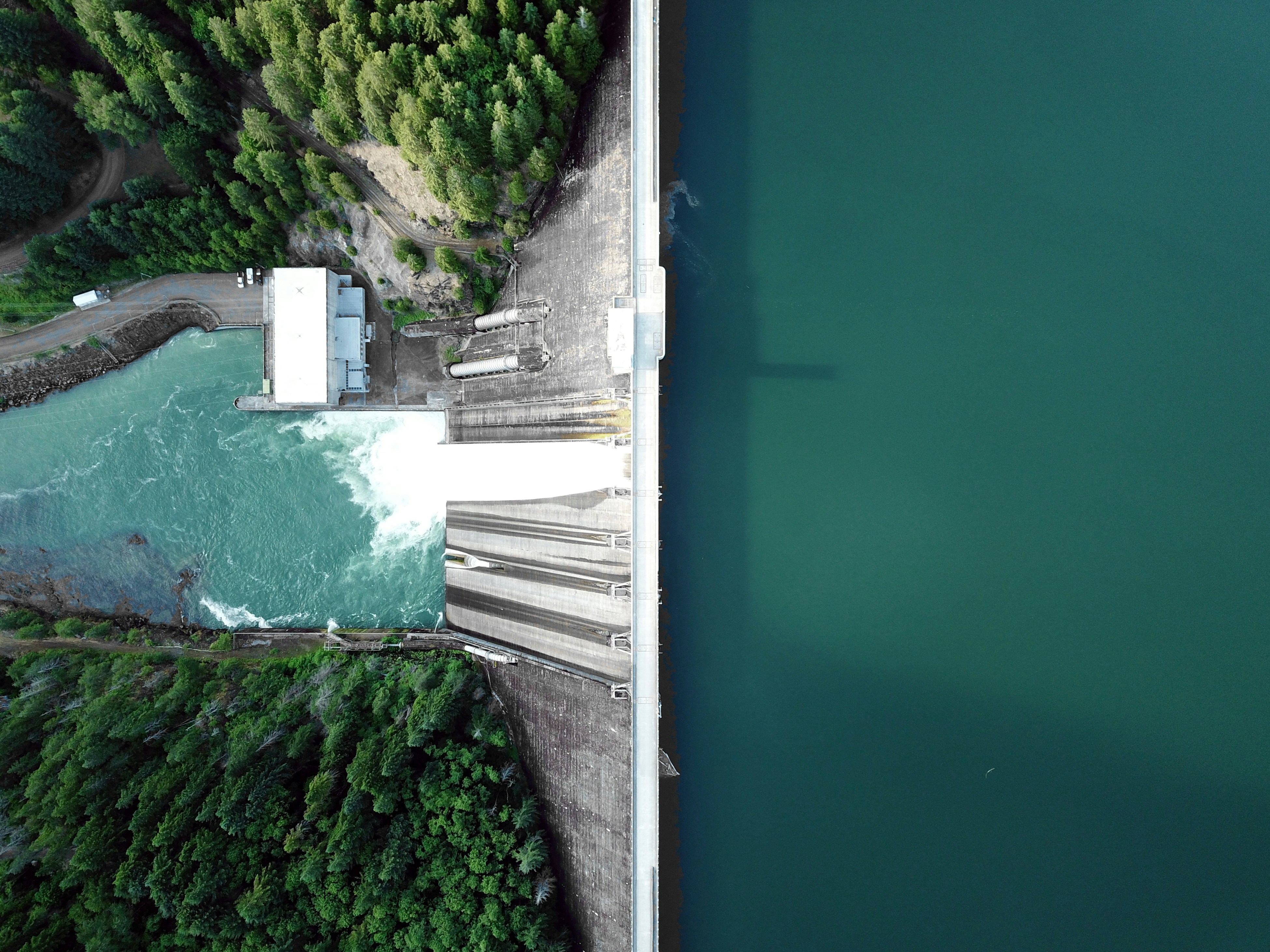 Aerial view of hydroelectric dam and reservoir
